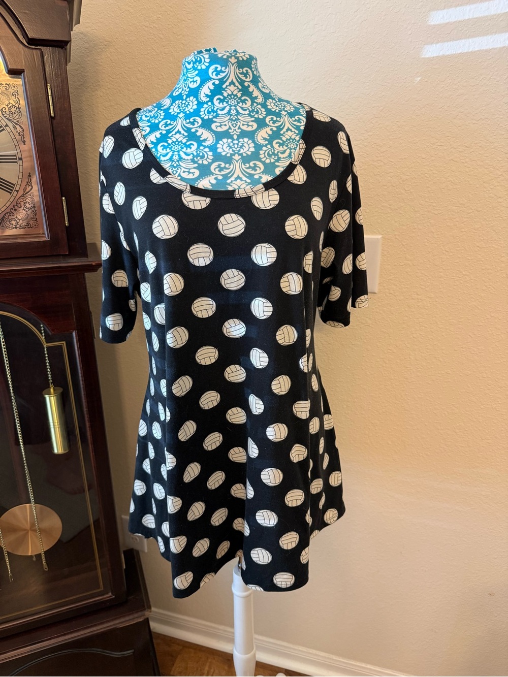 LuLaRoe Black Scoop Neck Top with White Volleyball Print